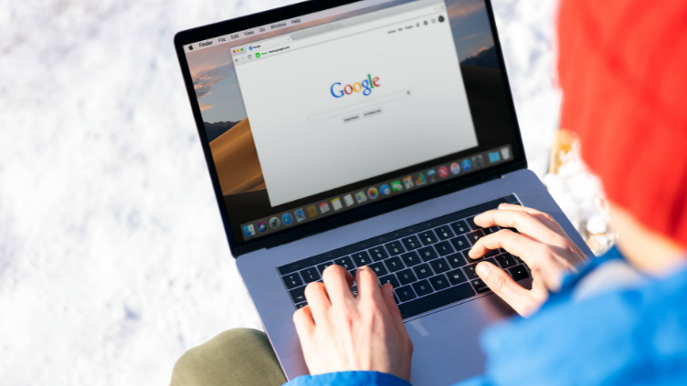 A laptop computer with an open google search