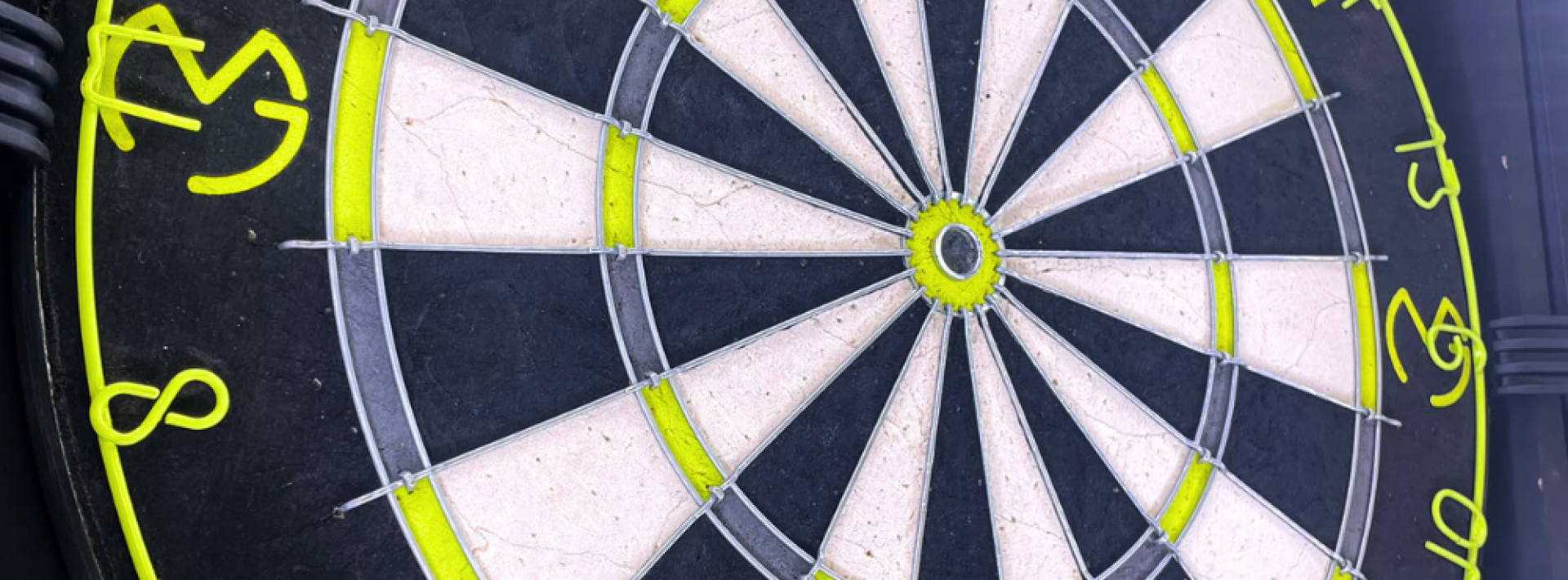 Green Space UK team taking part in a charity darts competition to raise money for Alzheimer’s Society